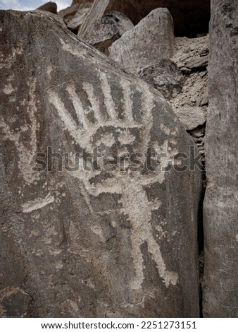 Huancor petroglyphs, humanoid figure carved in rock, ancient culture, Peru, South America