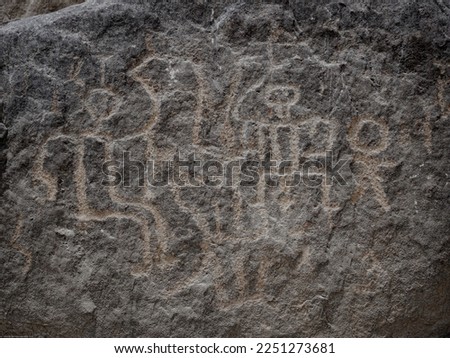 Huancor petroglyphs, humanoid figures carved in the rock, ancient culture, Peru, South America