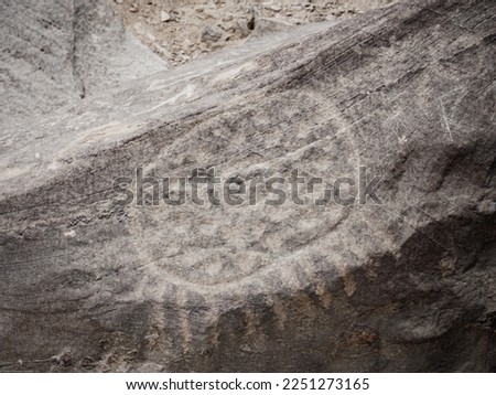 Huancor petroglyphs, rounded figure carved in rock, ancient culture, Peru, South America