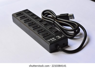 hub six port usb 3.0 superspeed black 5 volt power with white background for connection keyboard mouse flashdisk. Usb is not plugged in.