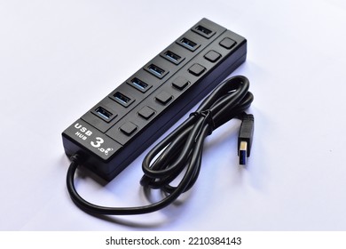 hub six port usb 3.0 superspeed black 5 volt power with white background for connection keyboard mouse flashdisk. Usb is not plugged in.