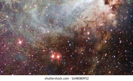 Hubble views galaxy and nebula. Elements of this image furnished by NASA.