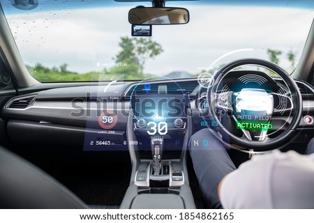 HUD Head Up Display and digital instruments panel autonomous car auto pilot self driving user interface navigation driving utility screen smart technology, businessman sleeping resting cruise mode