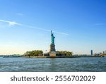 The Hudson River and the Statue of Liberty under the blue sky in New York USA