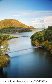 Hudson River Valley In Autumn With Colorful Mountain And Bridge Over Hudson River.