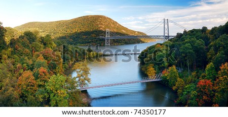 Hudson River valley panorama in Autumn with colorful mountain and Bridge over Hudson River.