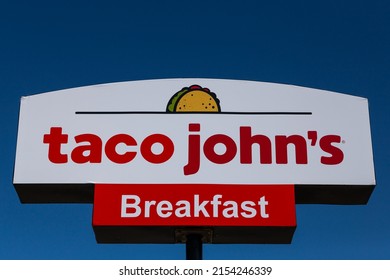 HUDSON, WI,USA - MARCH 26, 2022: Taco John's Restaurant Exterior Sign And Trademark Logo.