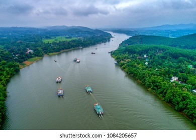 HUE, VIETNAM - APRIL 18,2018: Aerial view of festival Hon Chen temple on Huong river, Hue, Vietnam. Hon Chen festival takes place in March and July lunar calendar.