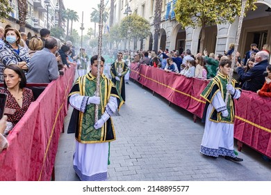 Huelva, Spain - April 13, 2022:  Altar Boy Or Acolyte In The Holy Week Procession