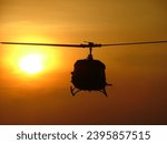 Huey silhouette at the sunset