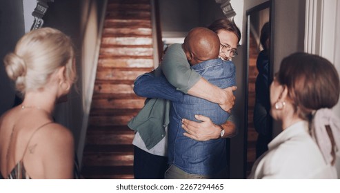 Hug, love and friends meeting at a reunion, home support and social celebration at a housewarming. Diversity welcome, affection greeting and men and women hosting a party to celebrate friendship - Powered by Shutterstock