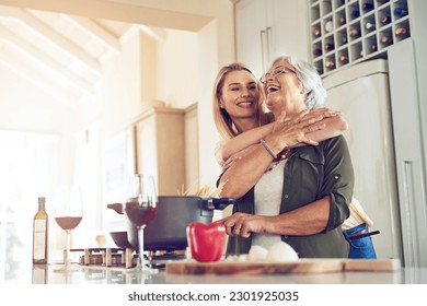 Hug, mother or happy woman cooking food for a healthy vegan diet together with love in family home. Smile, embrace or adult child hugging or helping senior mom in house kitchen for lunch or dinner - Powered by Shutterstock