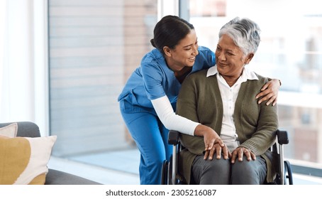 Hug, nurse with senior woman in wheelchair and talking for support. Happy, smile and communication with female nurse holding disabled senior patients hand for caregiver in nursing home consulting - Powered by Shutterstock