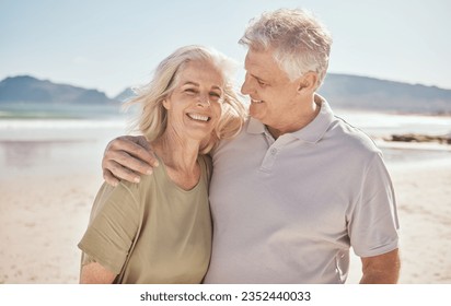 Hug, senior couple and outdoor at the beach with happiness, freedom and love on vacation. Portrait of a man and woman on retirement holiday, adventure and romantic trip in nature to relax and travel - Powered by Shutterstock