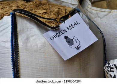 A Huge Bag Of Meal Food With A Chicken Feed Sign On A Big White Bag On A Farm.