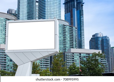 Huge Blank Billboard In Front Of Tall Office And Apartment Buildings In The City Of Toronto