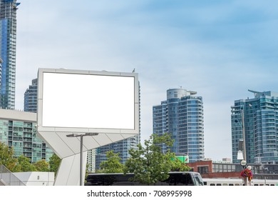 Huge Blank Billboard In Front Of Tall Office And Apartment Buildings In The City Of Toronto