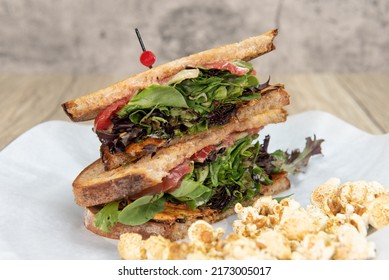 Huge BLT Bacon, Lettuce, Tomato Sandwich Loaded Ingredients Into A Double Deck Meal.