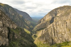 Huge Canyon Formed By Very High Vertical Walls, Inside It Runs A River That Forms Some Waterfalls. It Is Located In Serra Do Cipó, Brazil