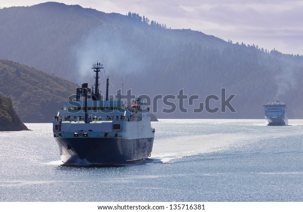 Huge car ferry ships in calm water of\
Marlborough Sounds  South Island  New\
Zealand