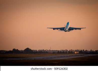 Huge Cargo Airplane Take Off During Sunset