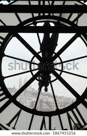 A huge clock face overlooking Paris