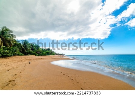 Huge cloud over La Perle beach in Guadeloupe, Caribbean sea