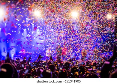 Huge Concert With People Lights And Confetti And Sillouette Party