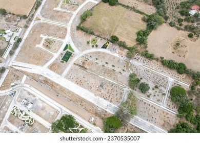 huge deforested fields invaded by urban sprawl. settlement. new residential subdivision. Arid and decertic land.