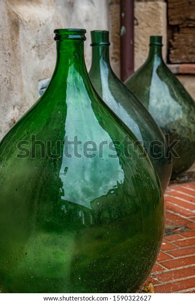 Huge empty
old wine jars closeup. Tuscany,
Italy.