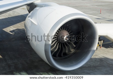 Huge engine of the Boeing 777-300ER, detailed view of the appearance of the turbine blades of an aircraft engine