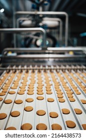 Huge Factory Line For Sweet Food And Cookies Production. Close Up Shots Of Industrial Manufacturing Process.