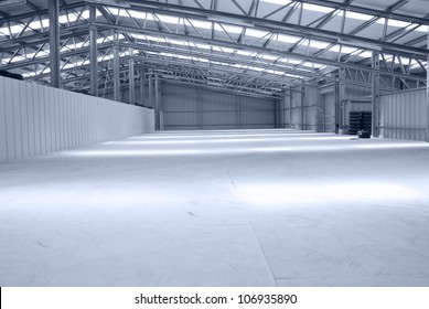 Huge Gray And Light Warehouse With Metal Roof