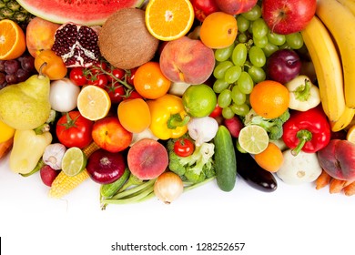 Huge group of fresh vegetables and fruits isolated on a white background. Shot in a studio - Powered by Shutterstock