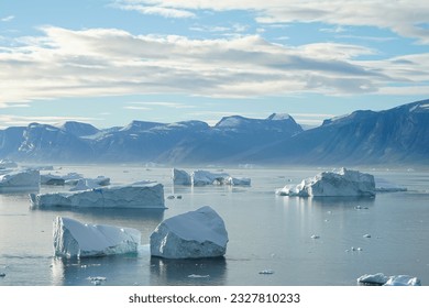 Huge icebergs floating near coast of Greenland - Powered by Shutterstock