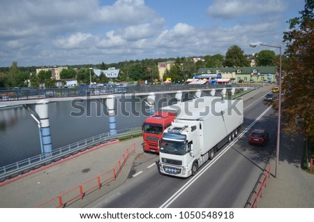 Huge lorries on the road-car transport, Augustow town, Podlasie, Poland