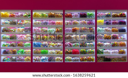 Huge pick and mix selection of sweets in a candy shop