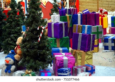 Huge Pile Of Christmas Presents And Christmas Trees In A Shopping Mall Ready For The Holiday Season