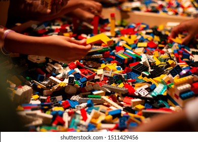 Huge Pile Of Colorful Lego Bricks With Childrens Hands