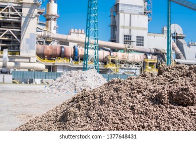 Huge pile of waste paper used as alternative fuel in rotary kiln in cement plant