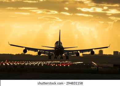 Huge plane is landing on the runway.