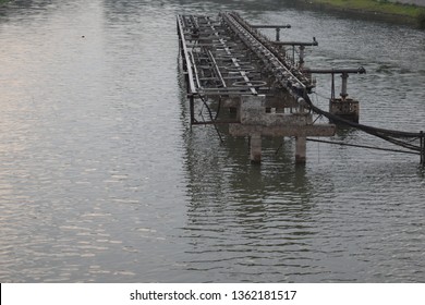 Huge pumping machine inside a artificial lake water