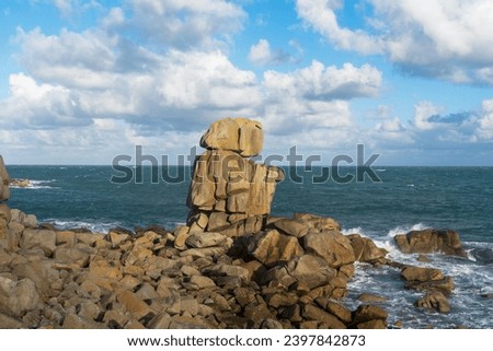 Huge rocks facing the sea along the Brittany coastline.