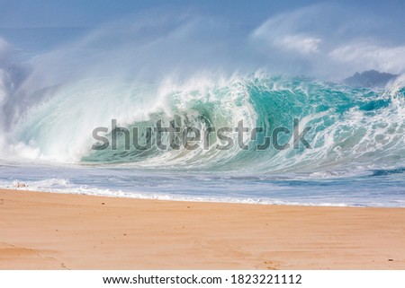 huge shore break wave crashing in hawaii