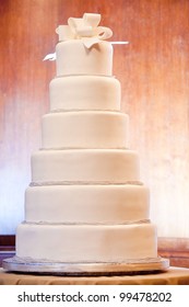 A Huge Six Level White Wedding Cake On Display