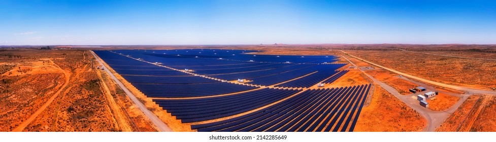 Huge Solar Power Plant With Panels For Renewable Energy At Broken Hill Mining City Of Australian Outback - Wide Aerial Panorama.
