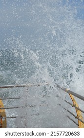 Huge Splash Of Water Near The Jetty