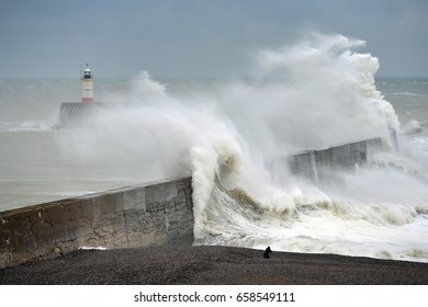 Huge Storm Waves Battering Newhaven Breakwater And Lighthouse, Sussex, UK