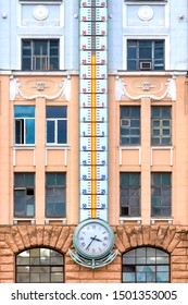 The Huge Thermometer On The Building. Very Big Measuring Instrument. Meteorological Research. Weather Change. Weather Forecast Concept.