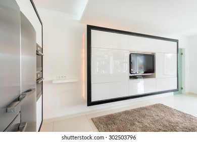 Huge TV On The Wall In A Modern Living Room